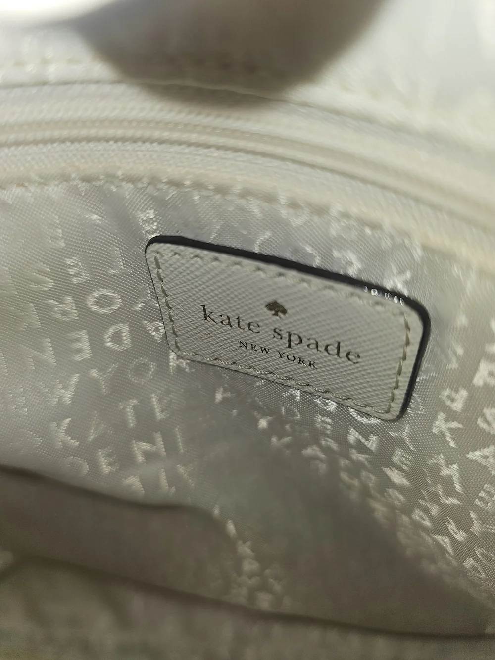 kate spade Laurel Way Leighann Cream Leather Tote with Black Handles